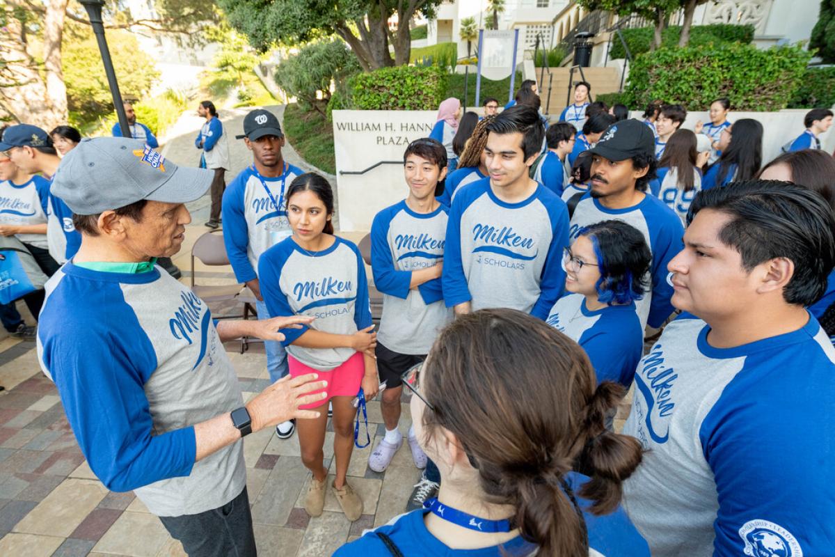 Mike Milken talking to Scholars